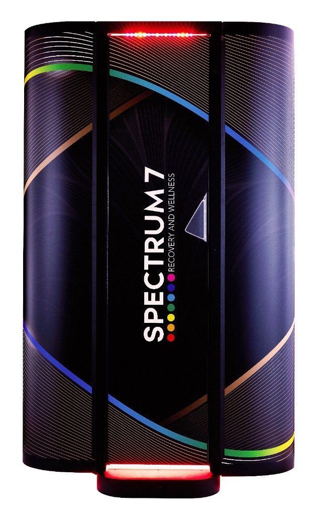 EXCELL Spectrum 7 recovery and wellness capsule with red accent lighting